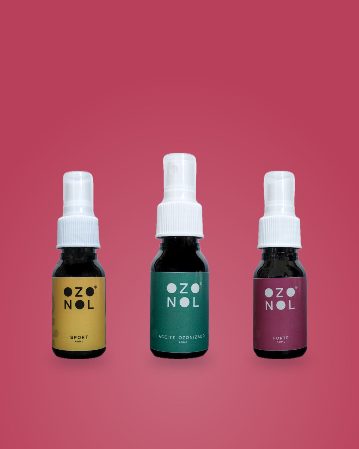 Trío de Aceites sobre fondo vino